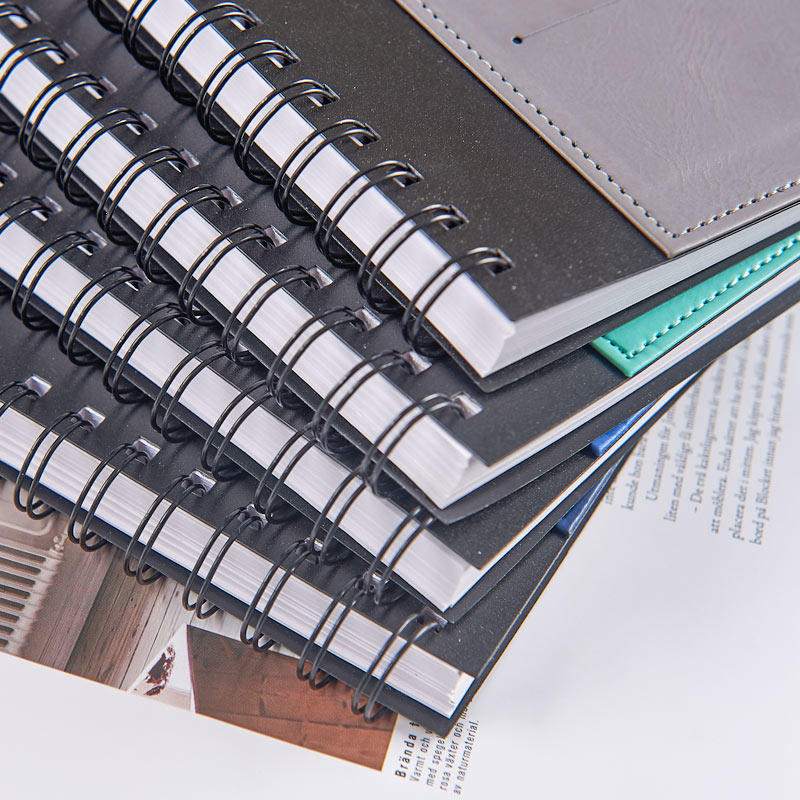 A5PP stitched  spiral notebook with PU ,six card slots and a penloop